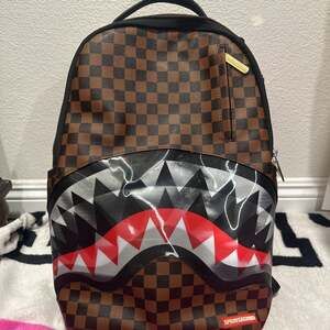 Sprayground Sharks In Paris Lenticular Chomp DLXSV Backpack